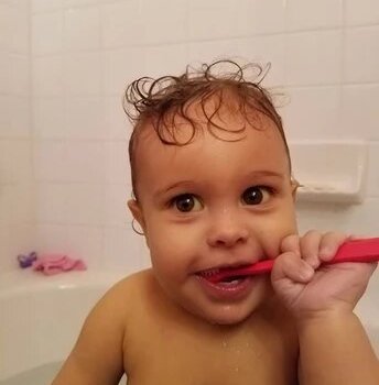 Brushing his teeth