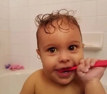 Brushing his teeth